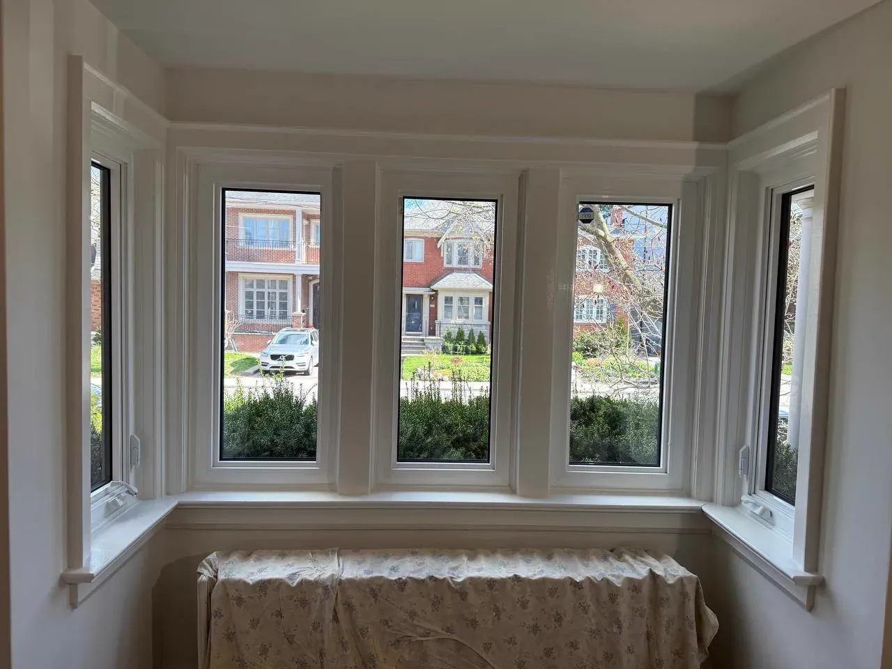 Finished bay window and trim in a home renovated by SQFT